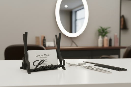 Personalized business card holder styled on a salon station countertop